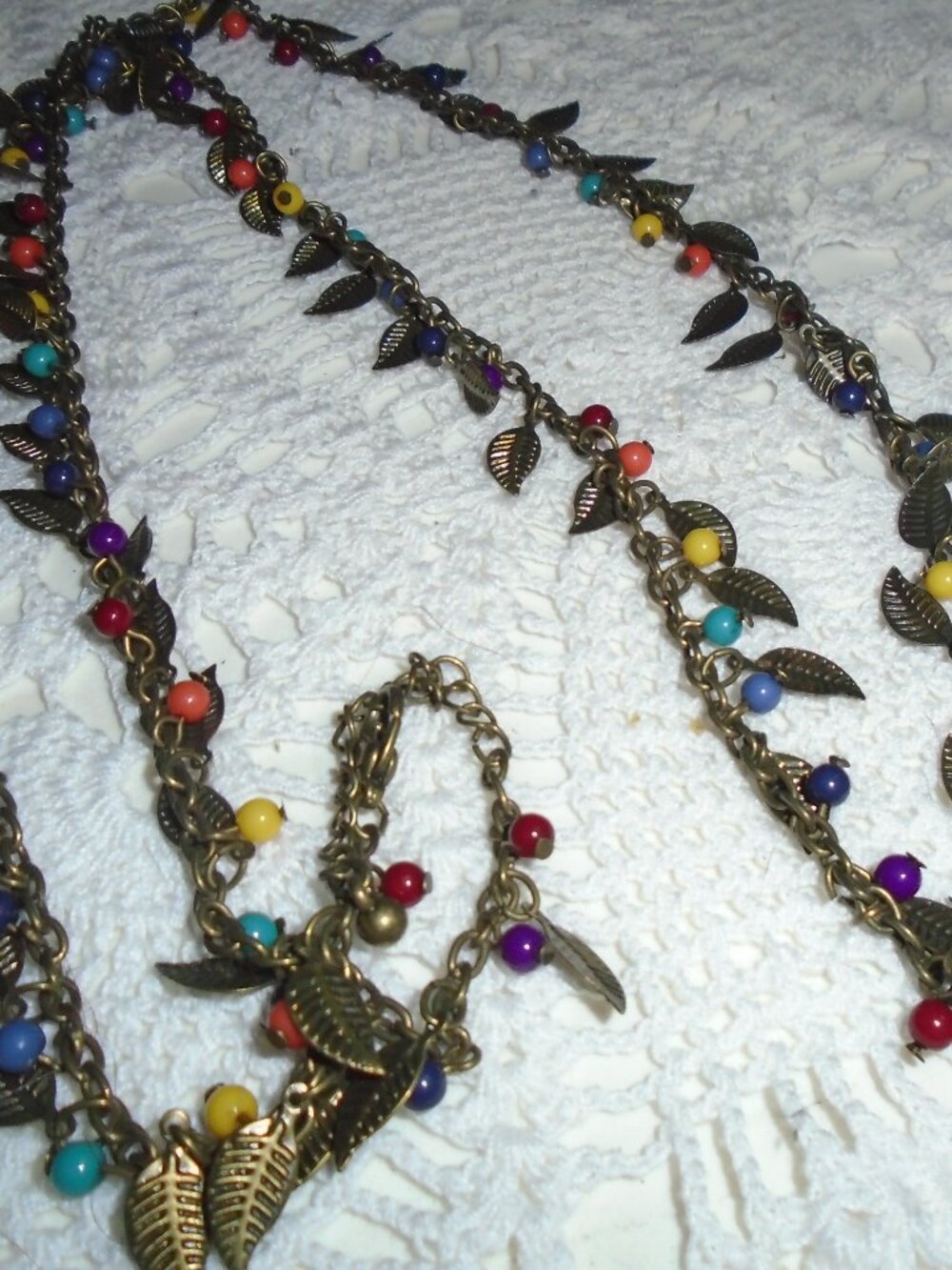 Very long leaf and bead necklace